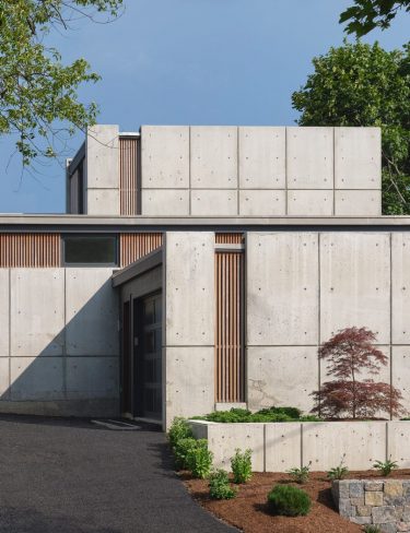 driveway entry of concrete home