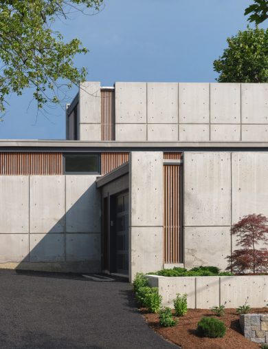 driveway entry of concrete home